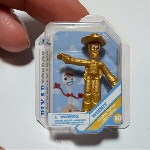 Mini brands Disney Gold Woody figurine- rare